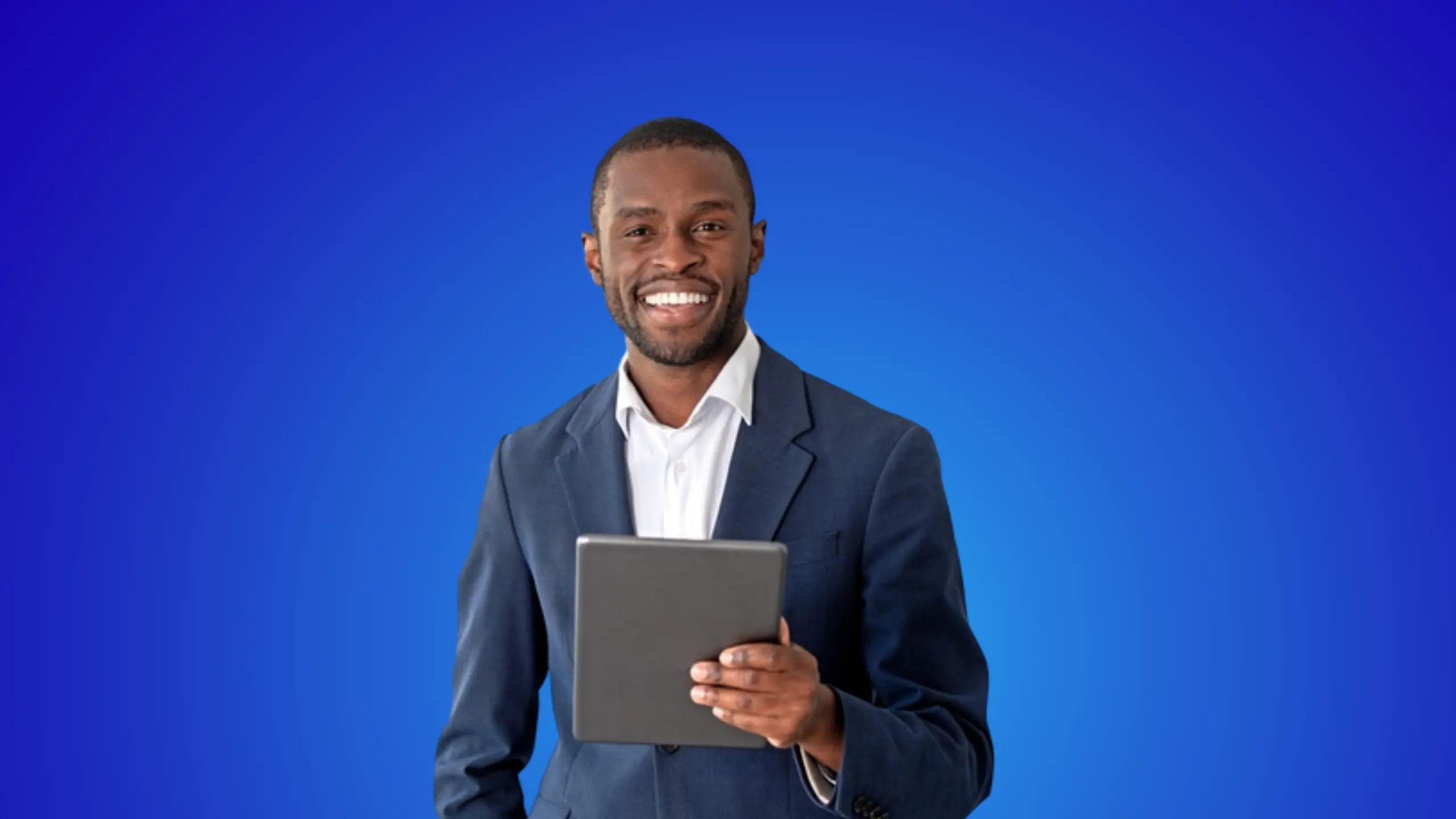 A millennial marketer hold a tablet and smiles